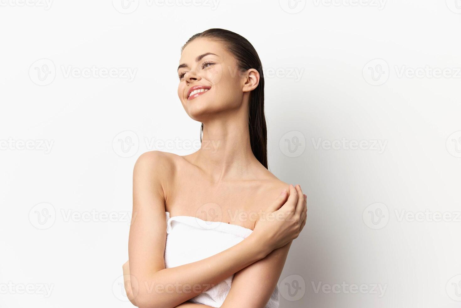 This image features a smiling young woman with flawless skin, exuding confidence while posing photo