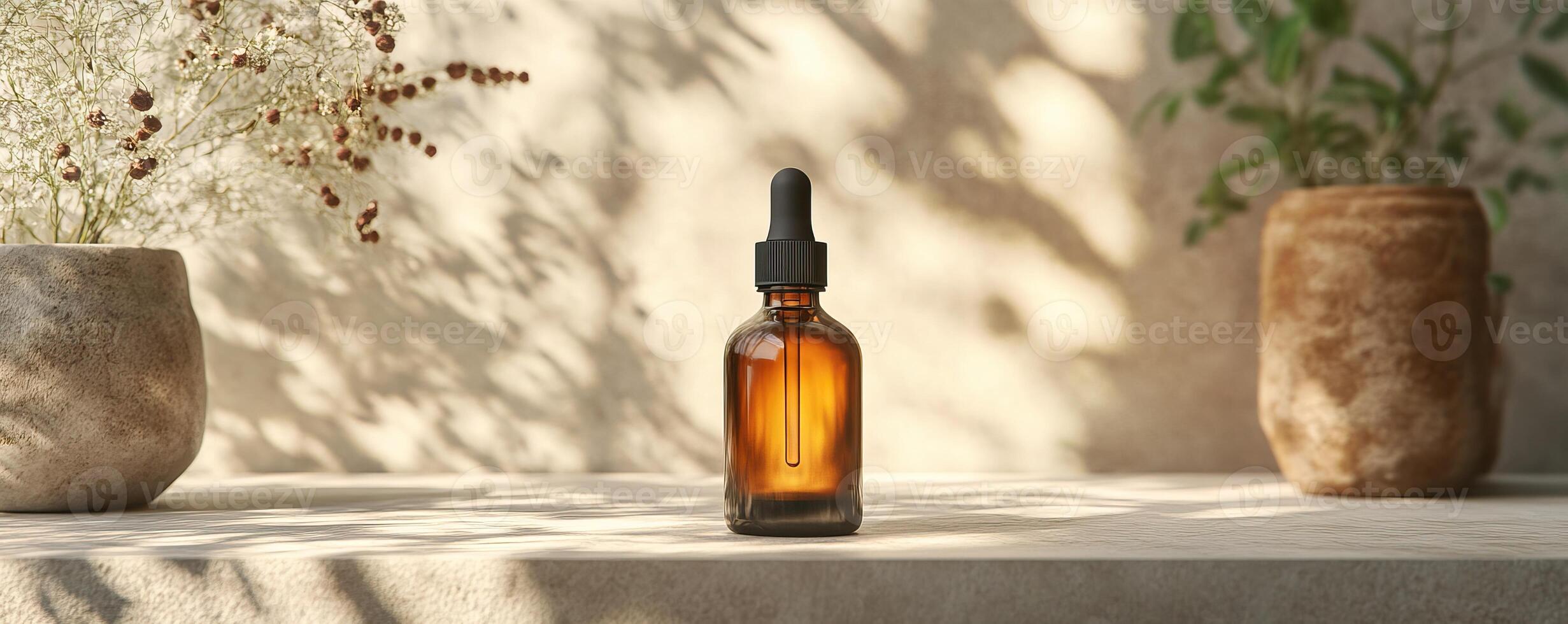 Amber glass dropper bottle on a minimalistic surface with decorative vases and soft shadows. photo