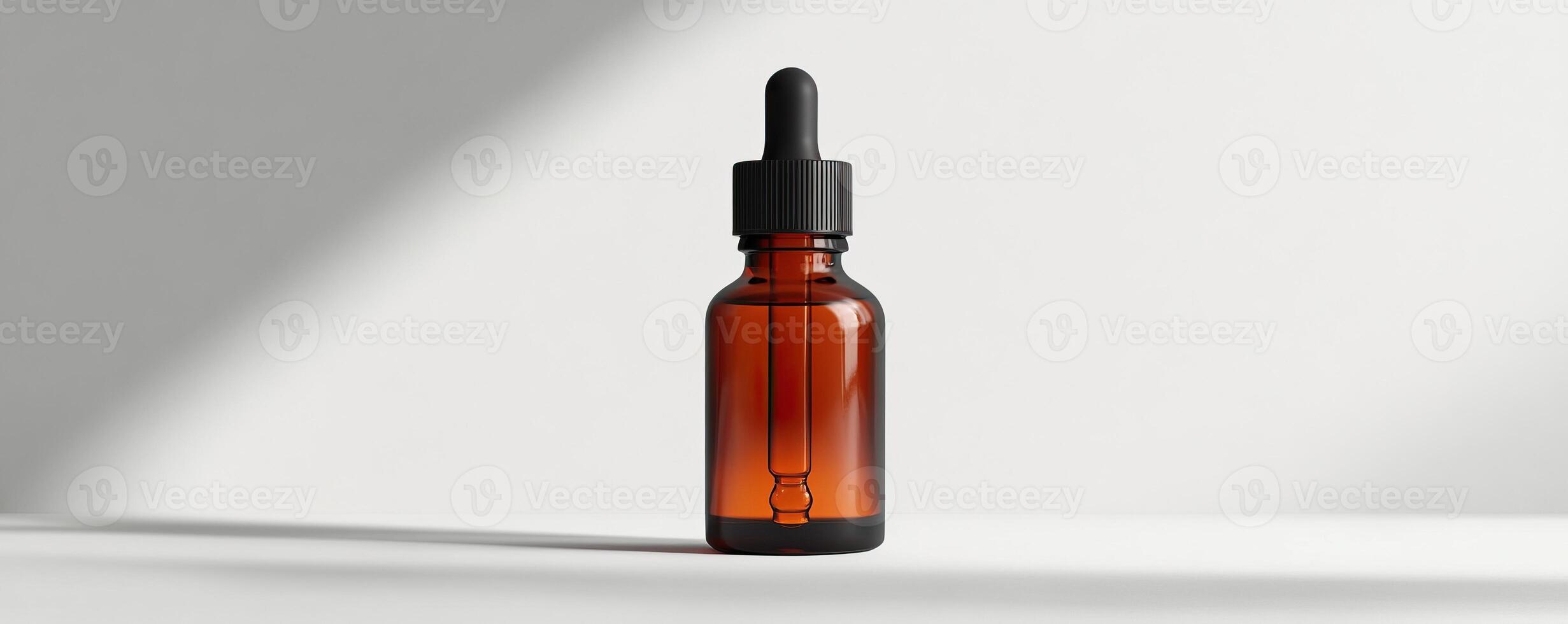 Amber glass dropper bottle on a minimalistic background, perfect for essential oils. photo
