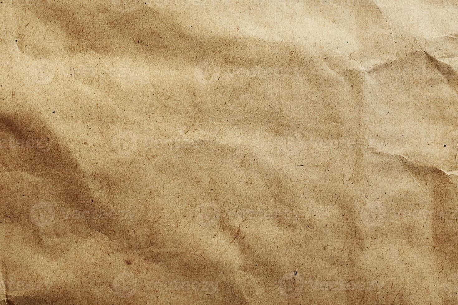 Crinkled brown paper texture, perfect for backgrounds and design projects. photo