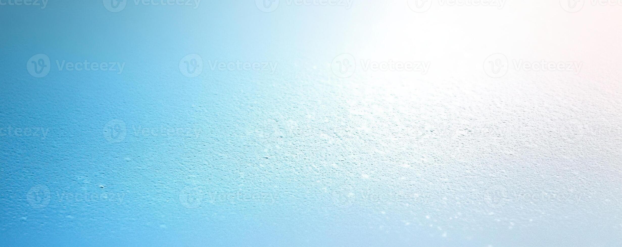 Abstract blue gradient texture with soft highlights on a light background. photo