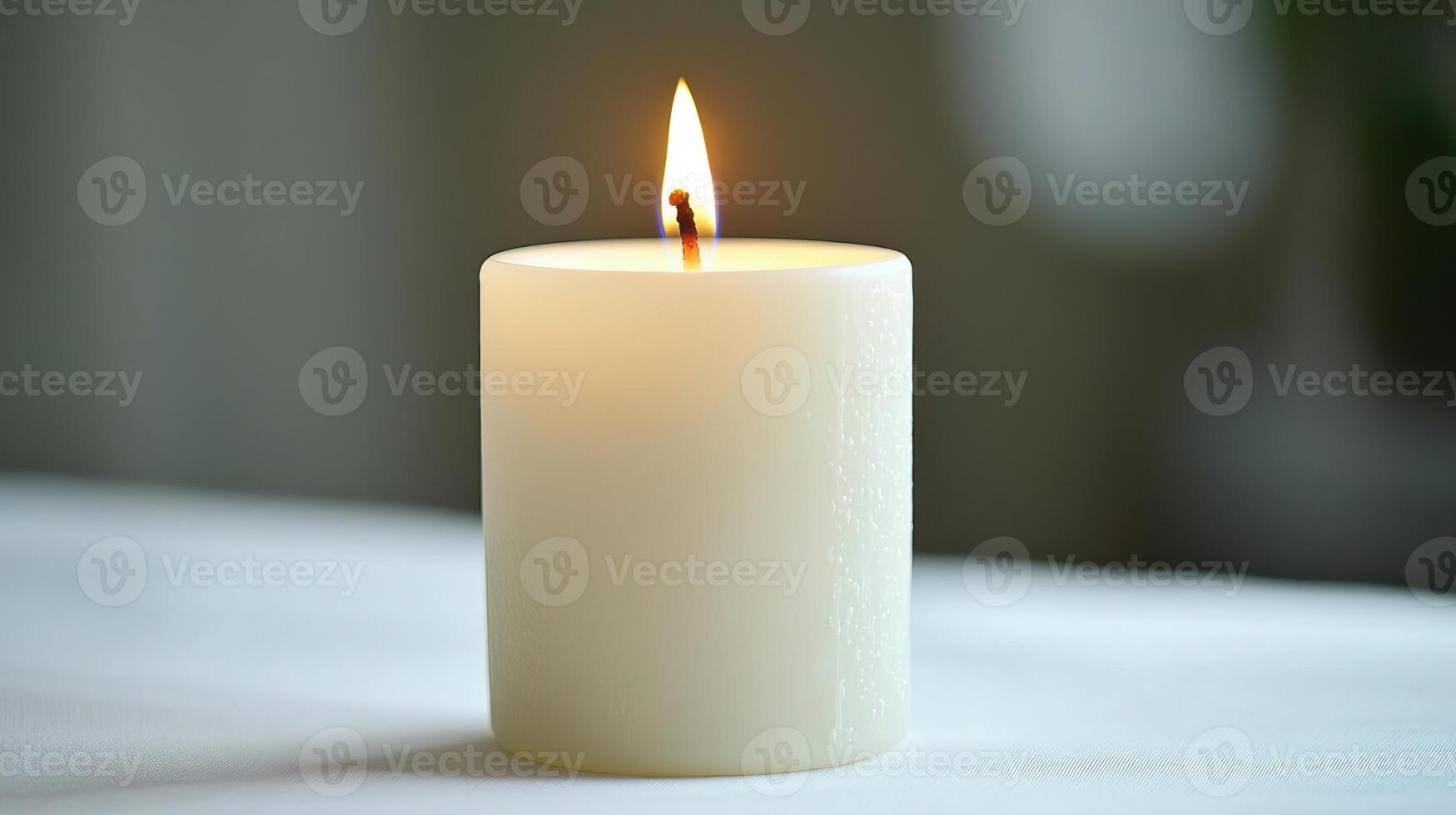 Minimalist composition featuring a white candle burning softly, with a simple white background, a study in serenity and simplicity photo