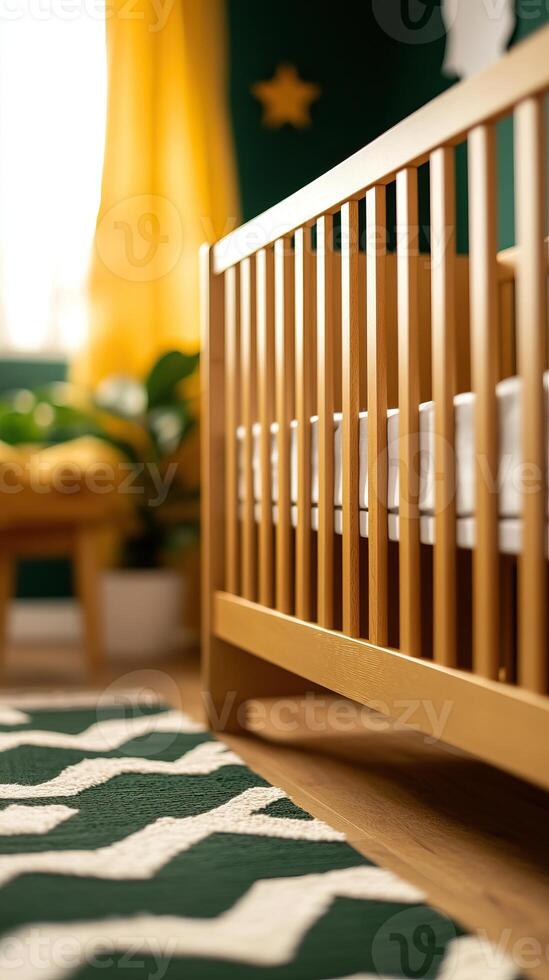Cozy nursery with wooden crib, yellow curtains, and decorative green rug in warm natural light. photo