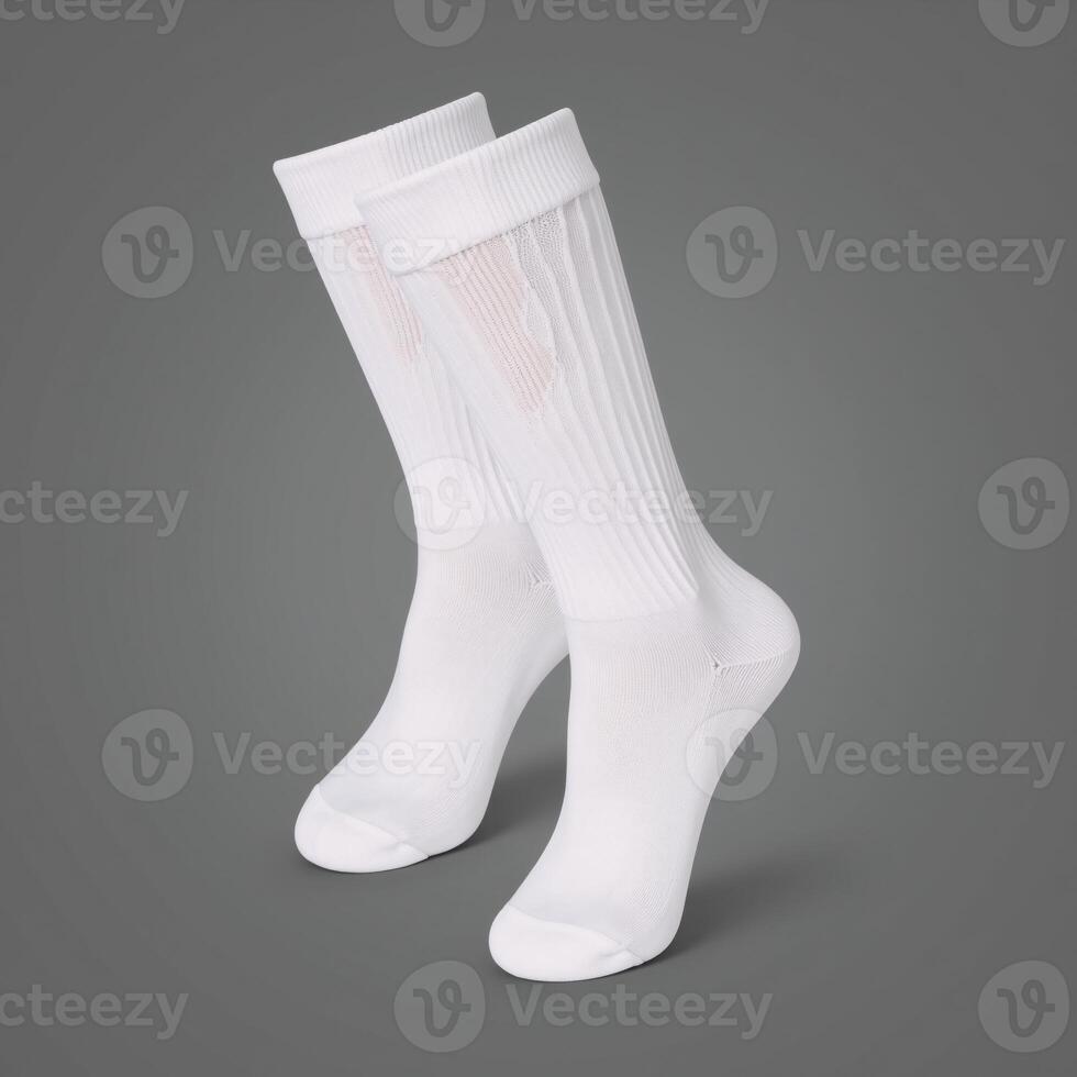 A closeup image featuring white socks against a gray backdrop photo