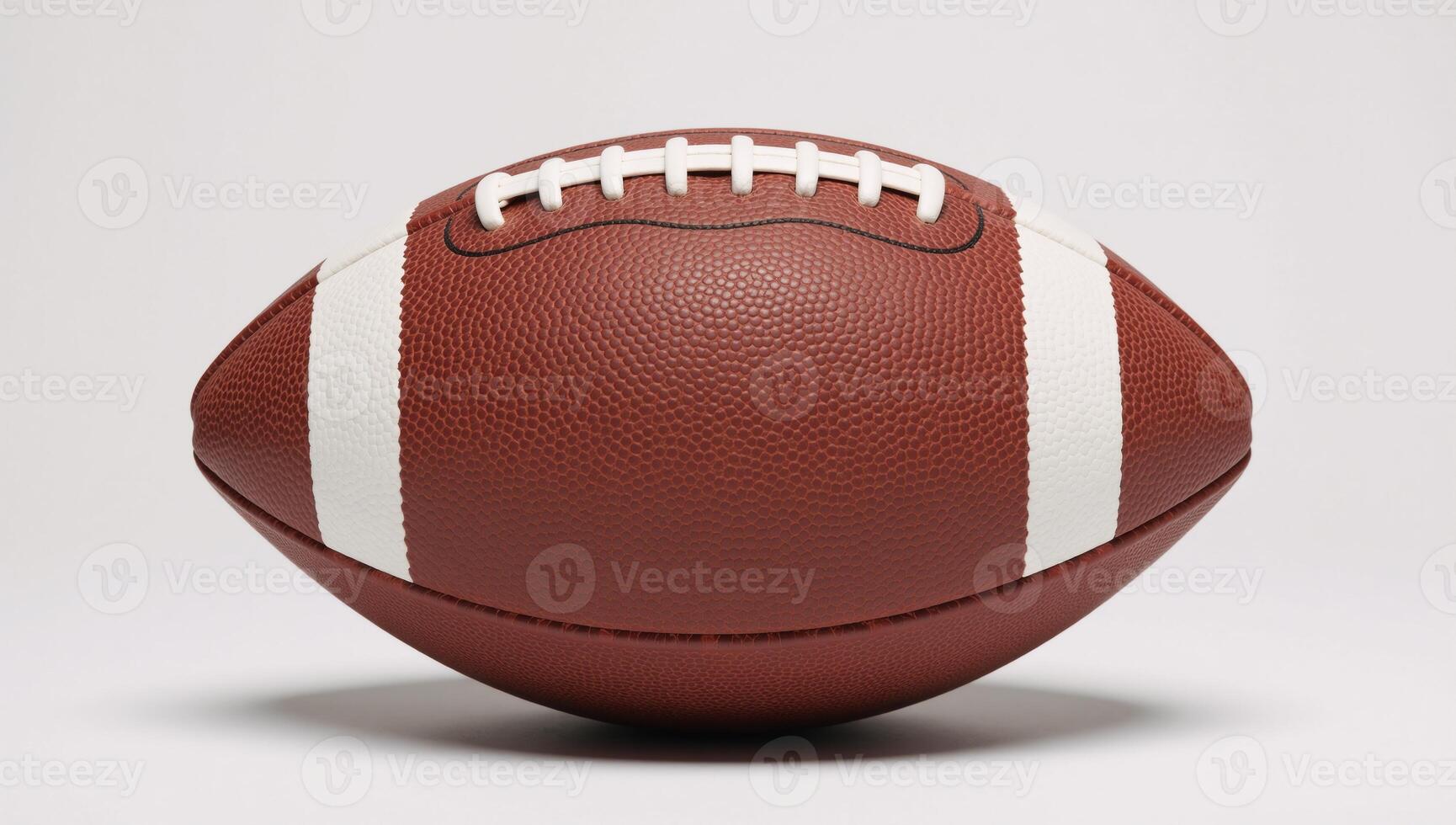 A striped American football featuring laced top edge photo