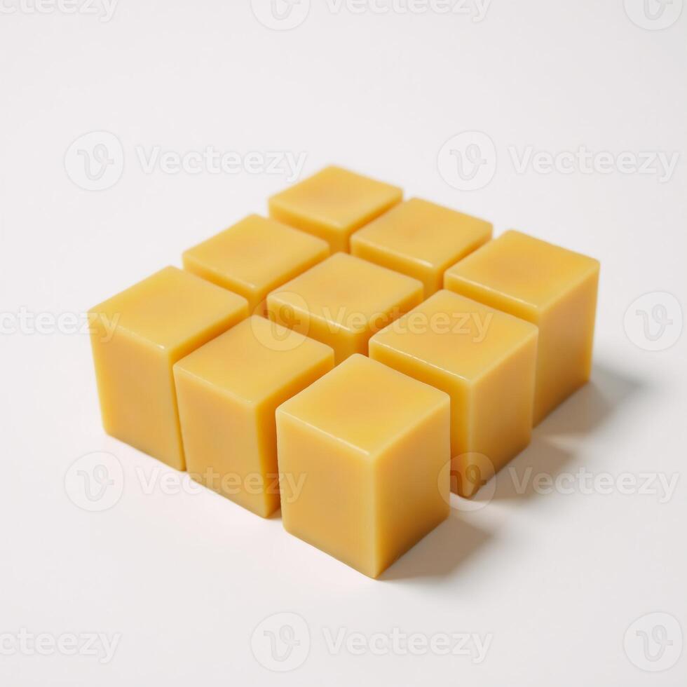 Arrange cheese cubes elegantly against white backdrop Minimalist composition photo