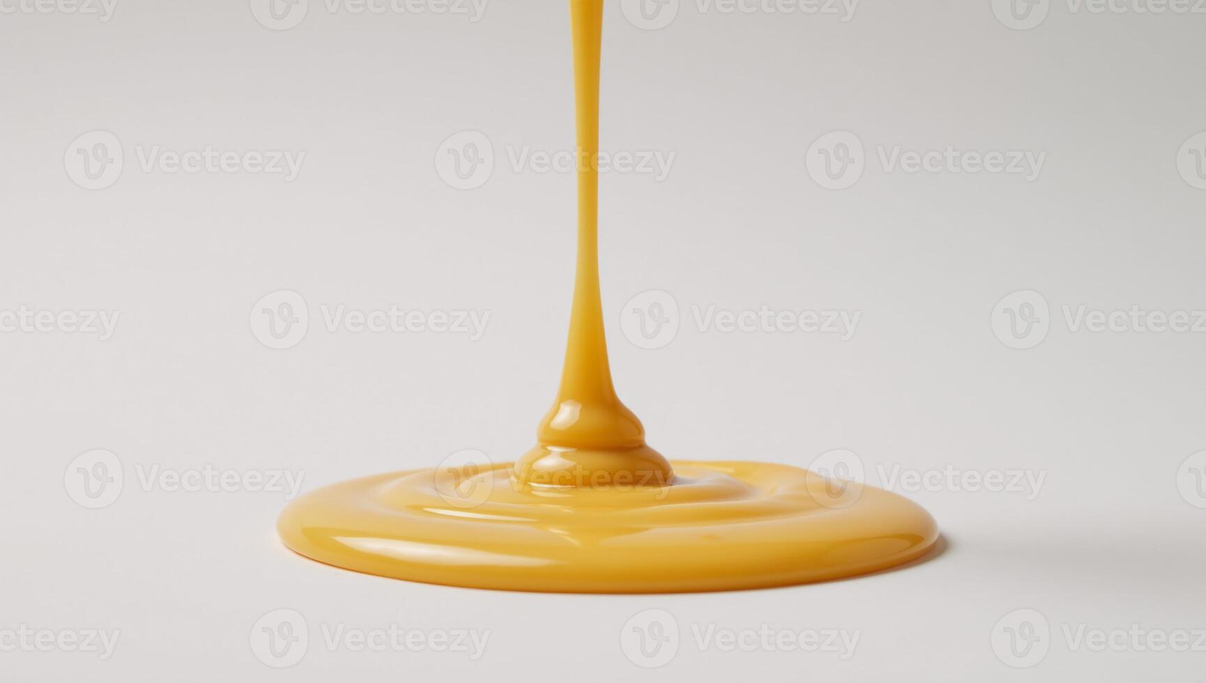 White backdrop with melted cheese sauce spill photo