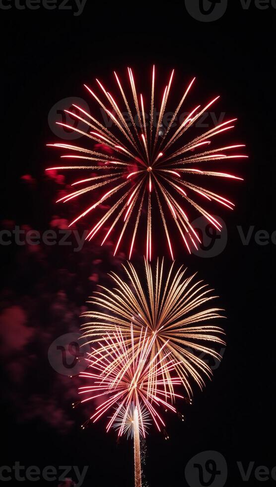 Stunning firework display featuring vivid colors exploding against a starry night sky photo