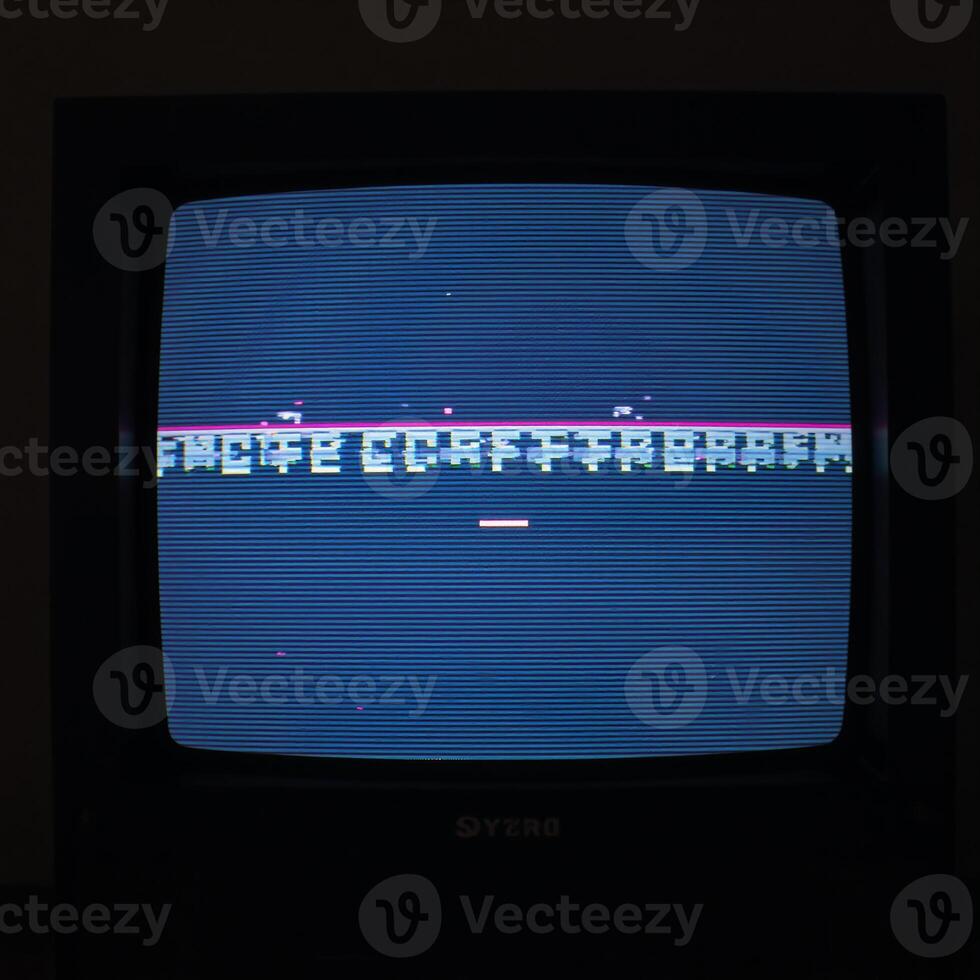 Glitched TV screen showcases pixelated background and distorted error broadcast complete with widespeed rewind effects photo