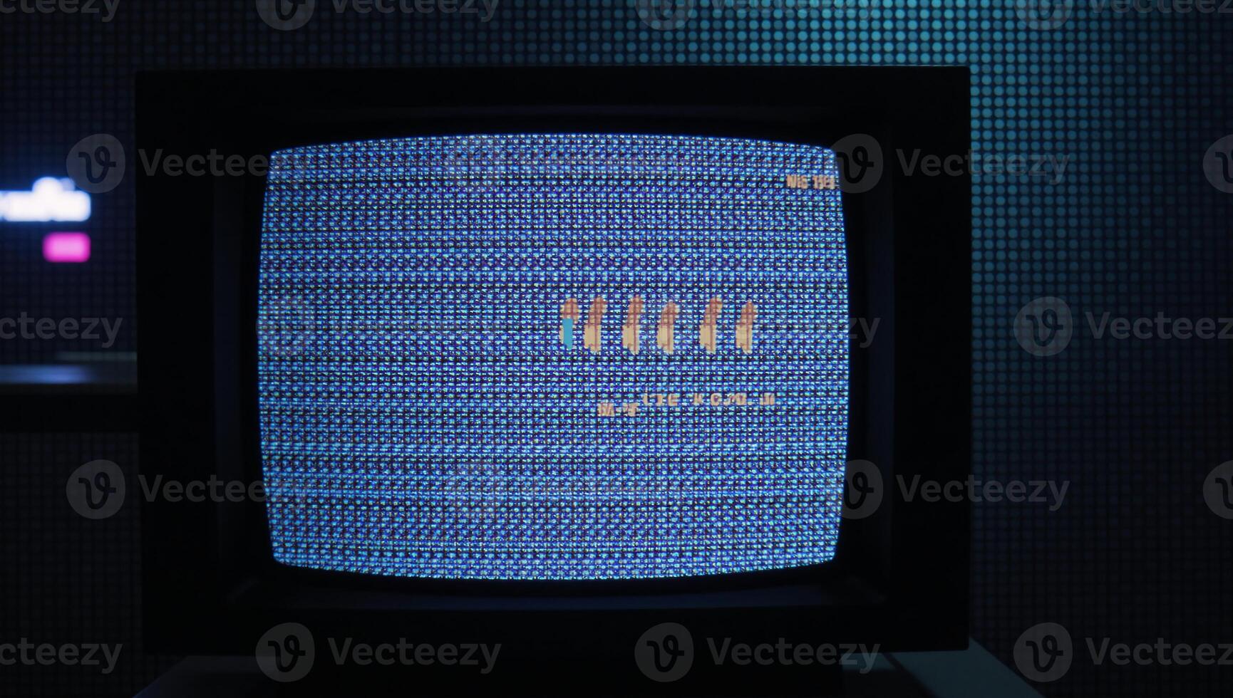 Glitched TV screen showcases pixelated background and distorted error broadcast complete with widespeed rewind effects photo
