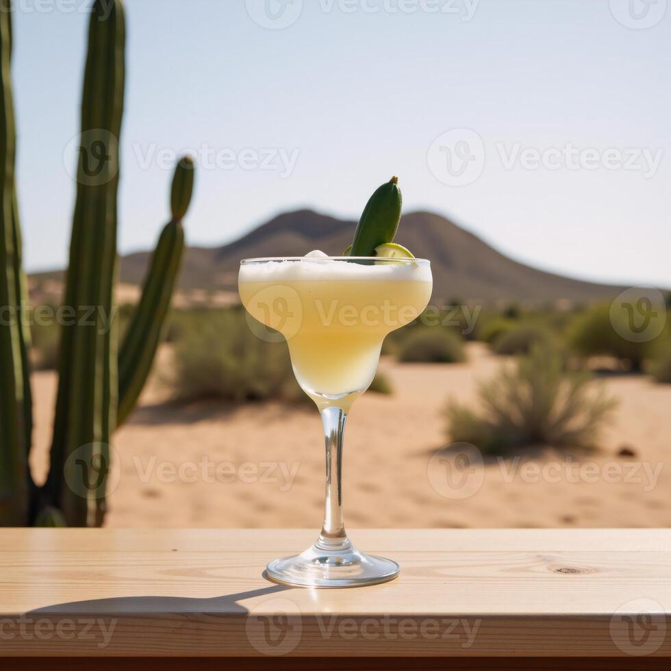 Cactusinfused Margarita served amidst a desert backdrop featuring cactus fruit lime garnish photo