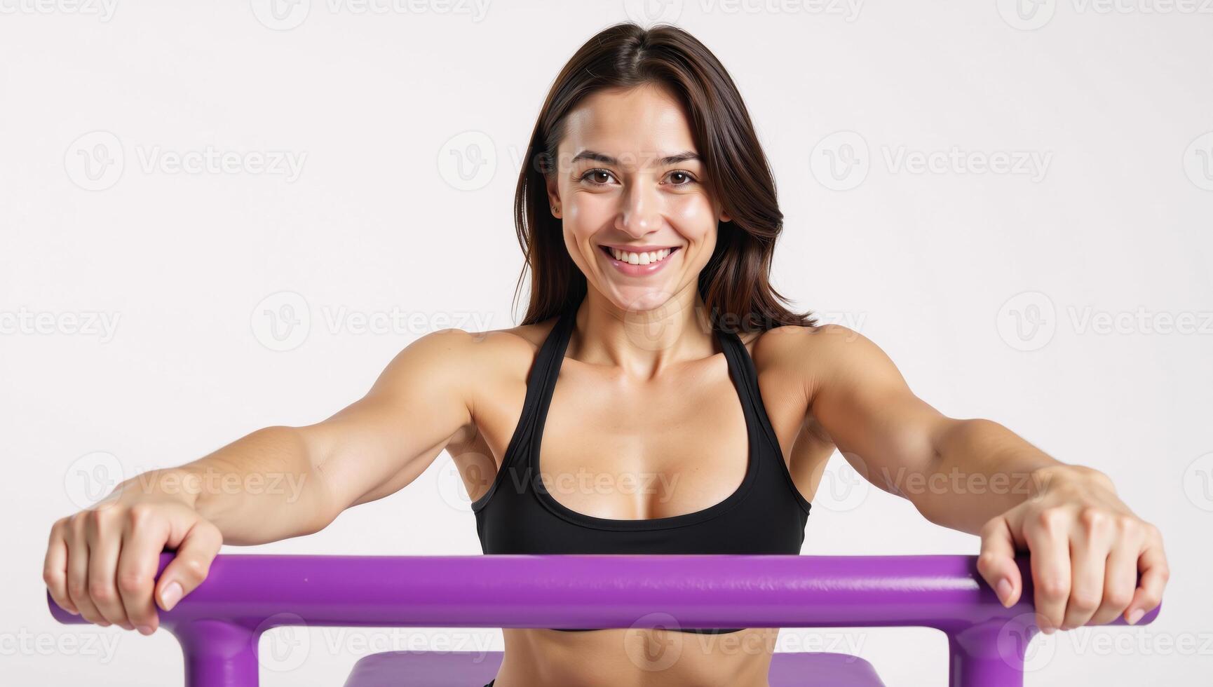 Fitness model poses on equipment against vibrant purple backdrop with ample white space for text or graphics Fit Brunette Rack Purple Background photo