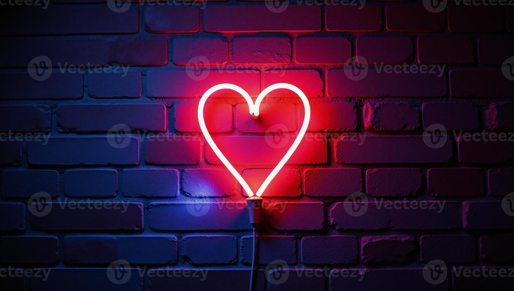 A vibrant red and blue neonlit heart against a brick wall backdrop photo