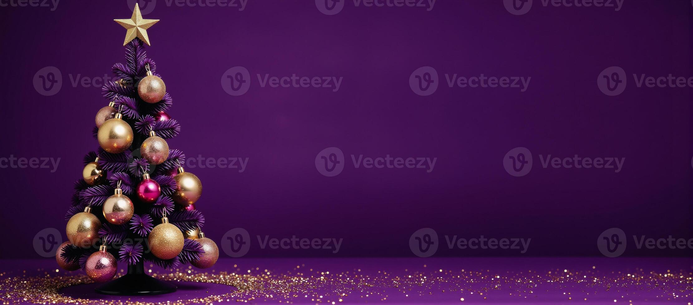 A Christmas tree decorated with gold ornaments adorns a purple backdrop complete with a shimmering gold star atop photo