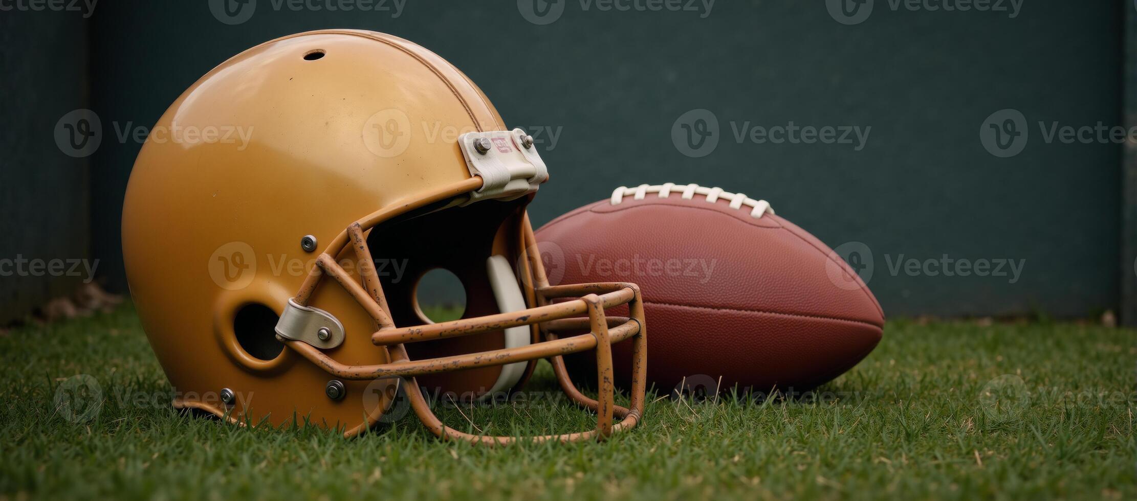 A retro gold football helmet with ball against a sporty backdrop highlights vintage American Football gear game spirit photo