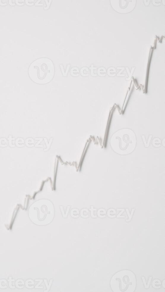 Minimalist smooth upward trend in stock prices displayed on a clean white chart photo