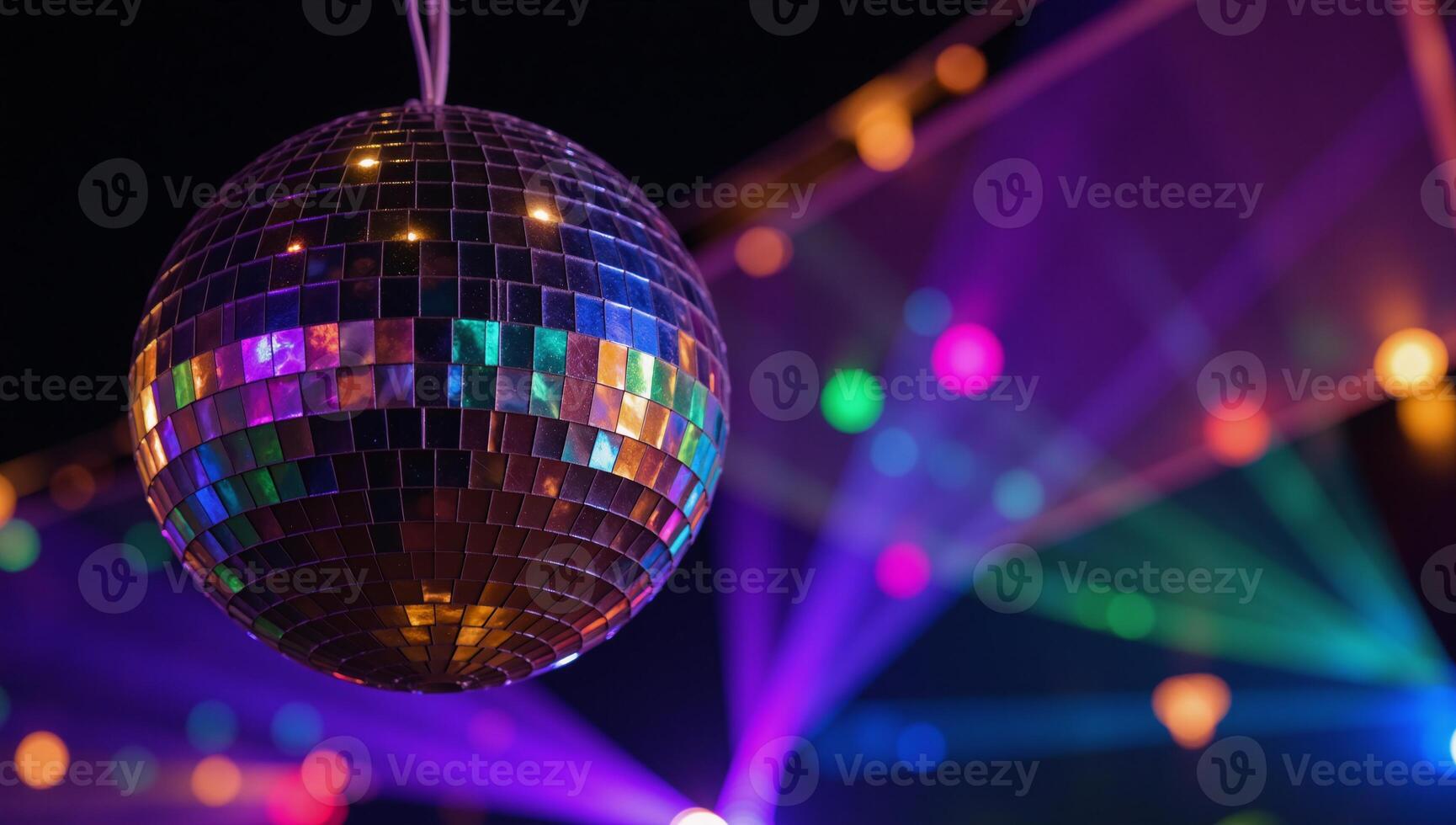 Vibrant disco ball at a glamorous event party scene photo