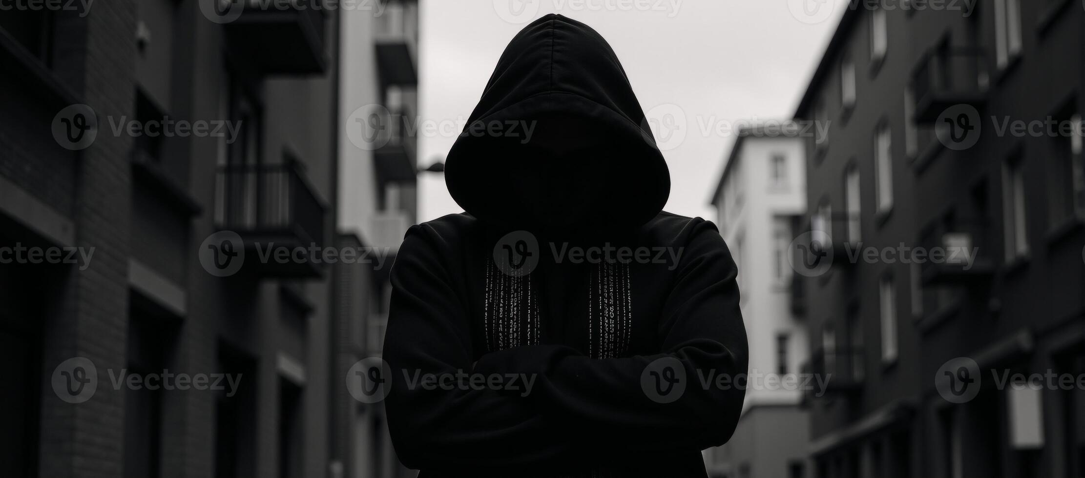 A Matrixinspired digital illustration showcases a hooded hackers silhouette with patterned detailing photo