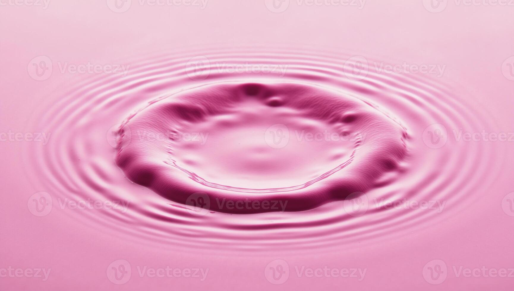 A pink circular water splash is displayed in an isolated setting photo