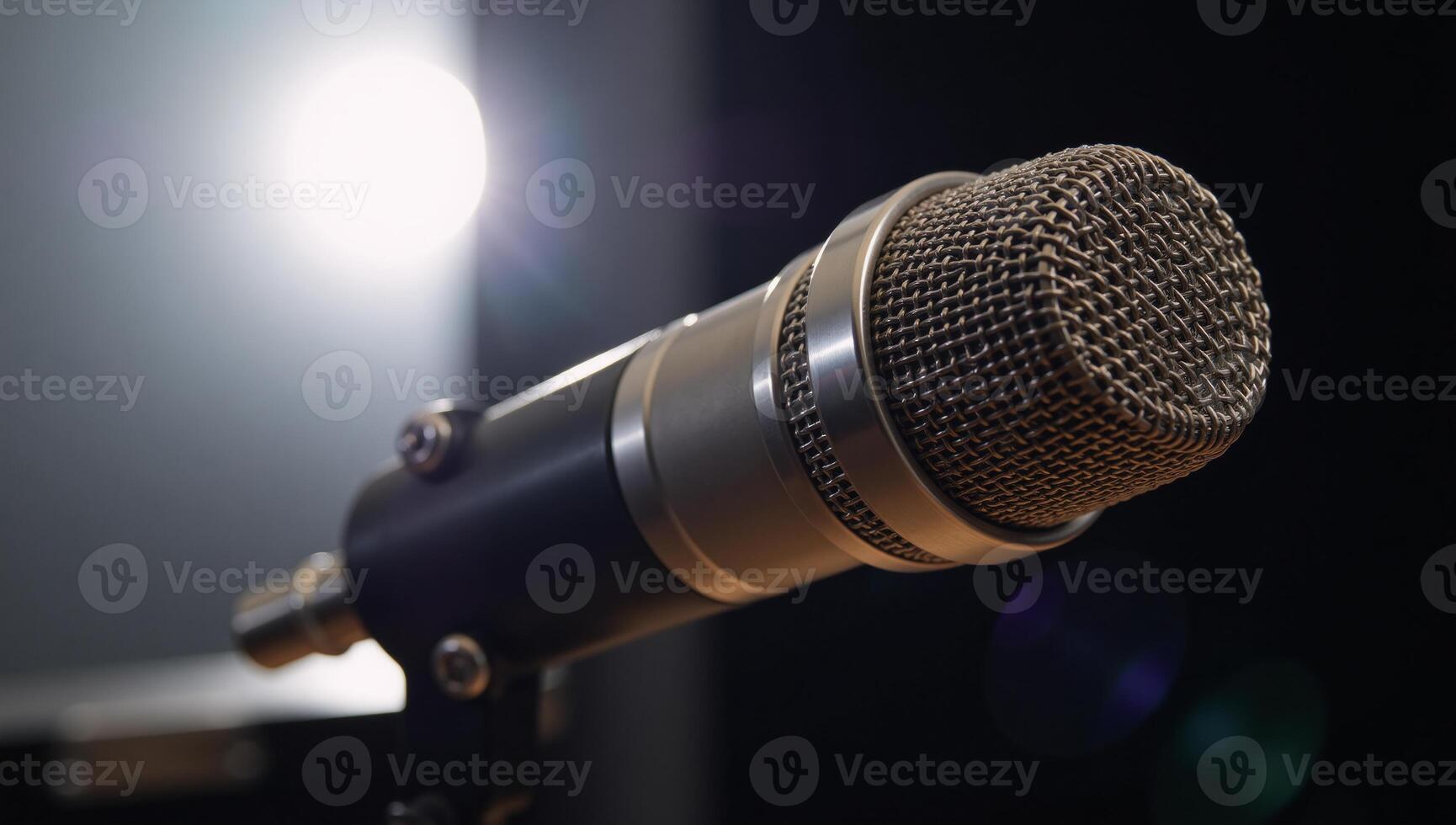 Closeup shot of microphone in recording studio setting photo