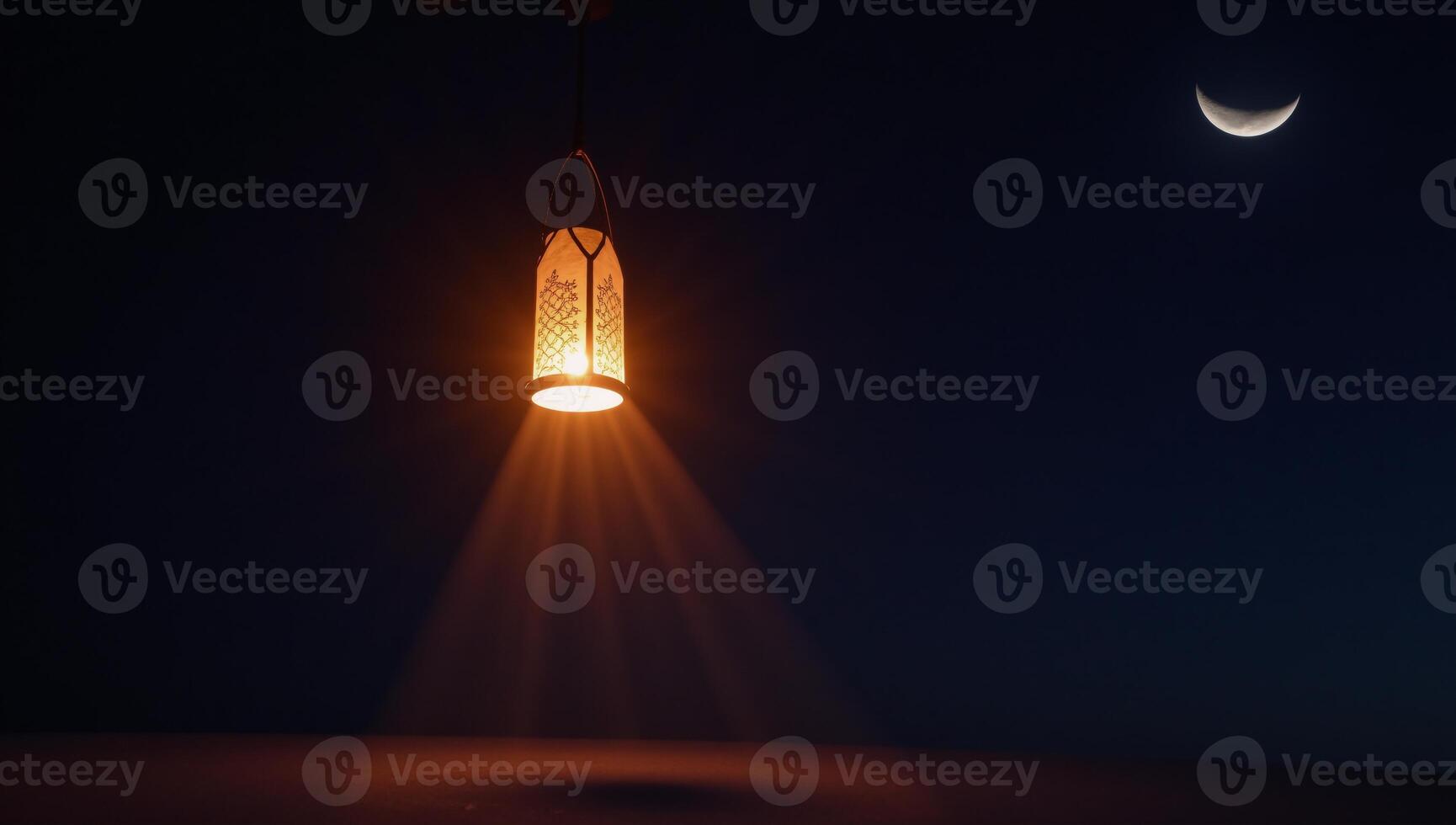 Lantern floats in night sky before crescent moon photo