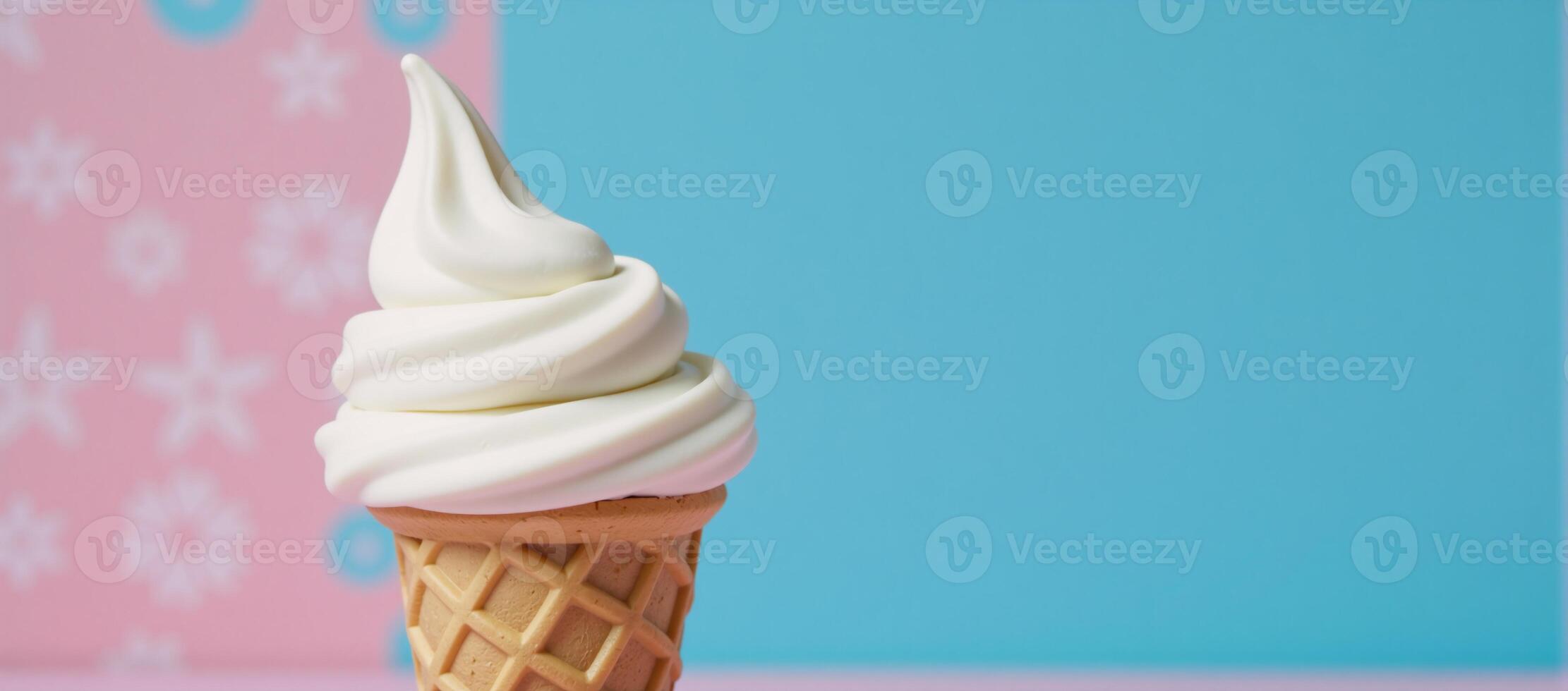 White ice cream cone against colorful backdrop blue pink photo