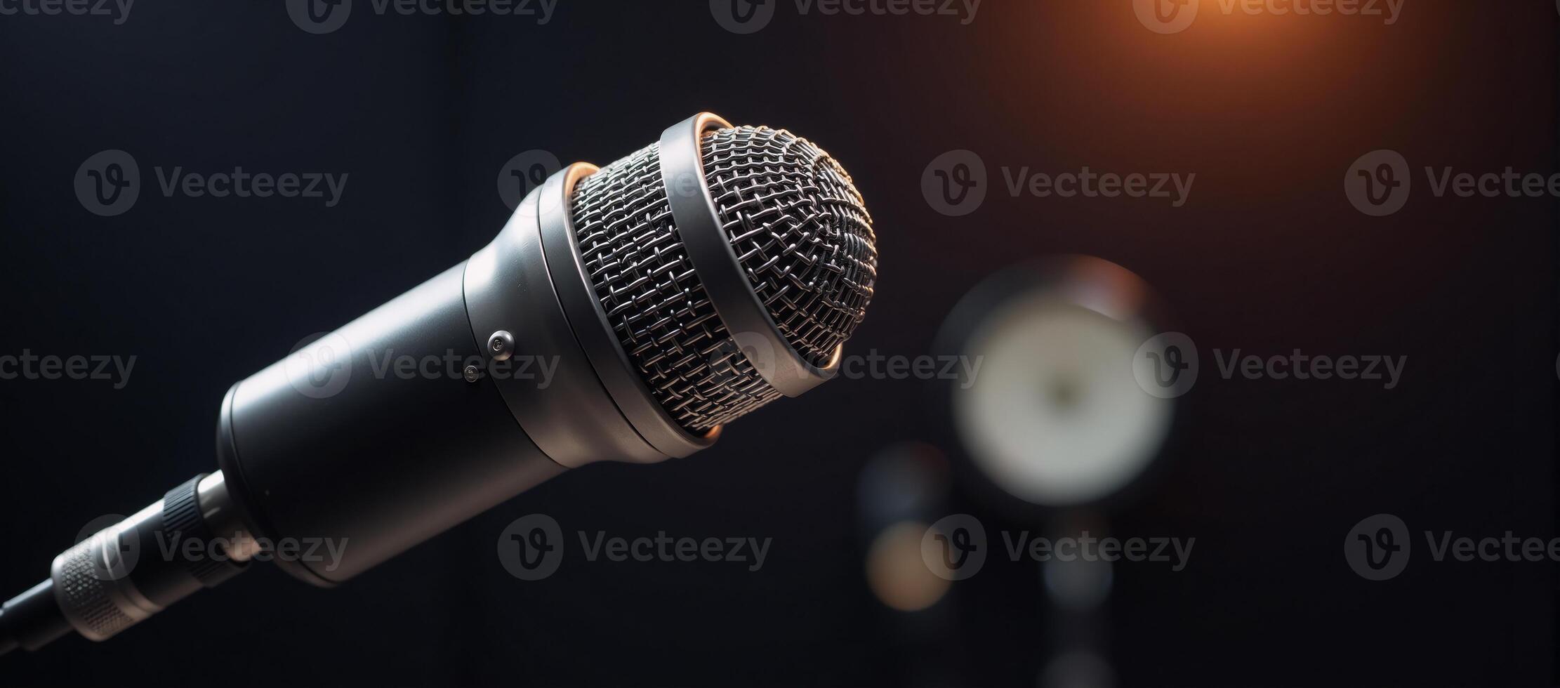 Closeup shot of microphone in recording studio setting photo