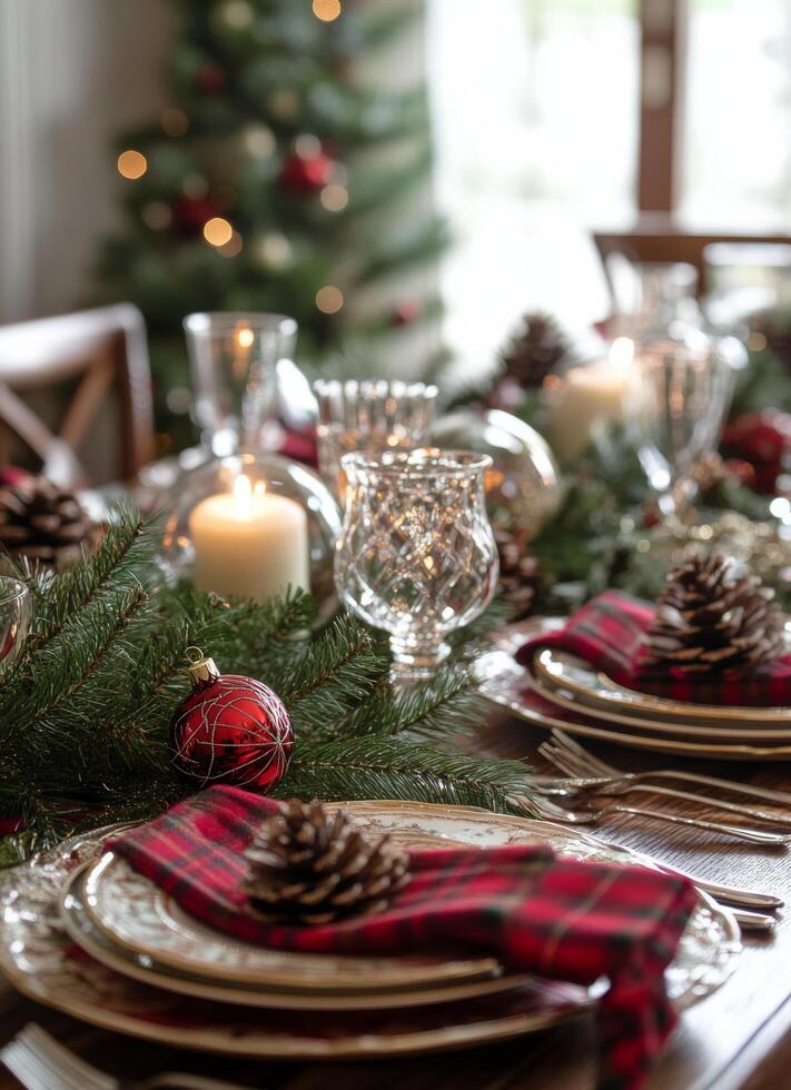 Elegant holiday dining table setup with candles and pine decorations in a cozy setting photo
