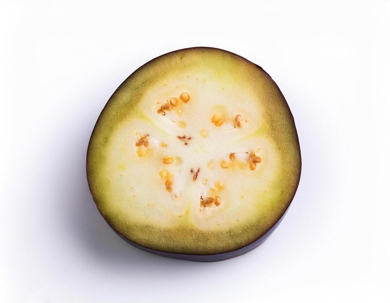 One slice of purple eggplant isolated, showing its rich texture and color photo