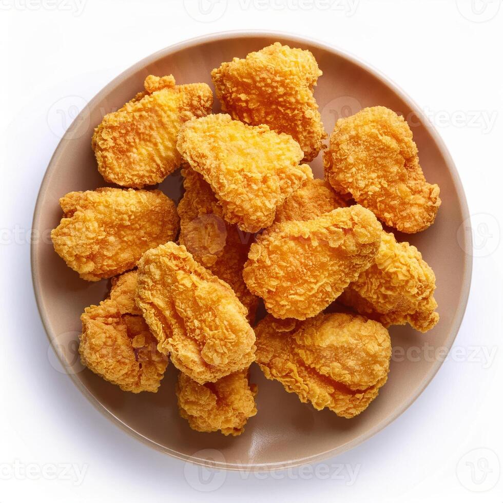 A plate of fried chicken nuggets on a white background photo