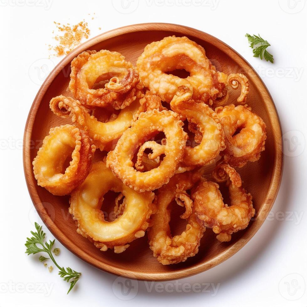 A plate of fried squid on a white background photo