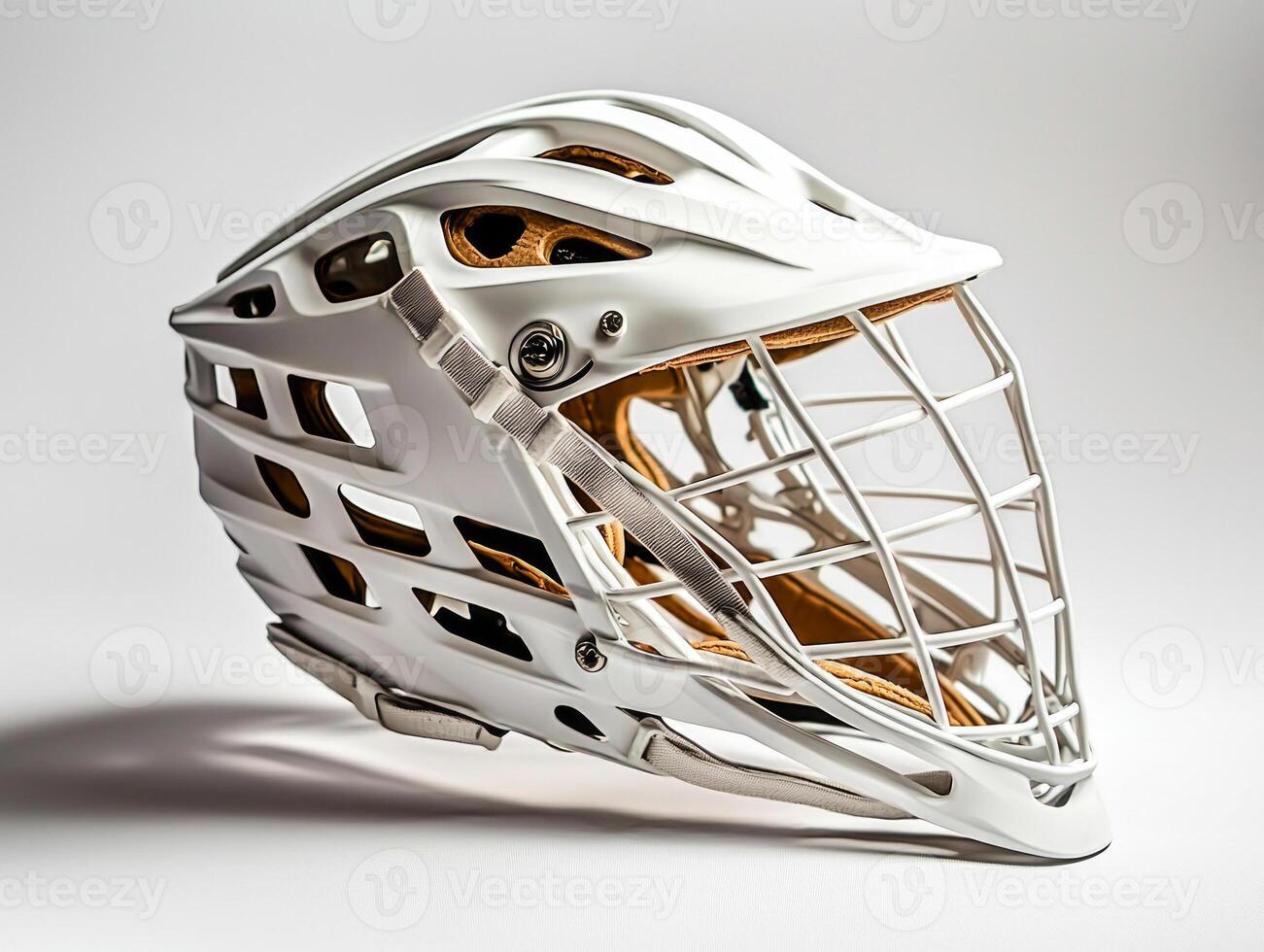 lacrosse helmet is displayed from the side highlighting its detailed cage and padding. Soft shadows enhance the helmets features under bright studio lighting. photo