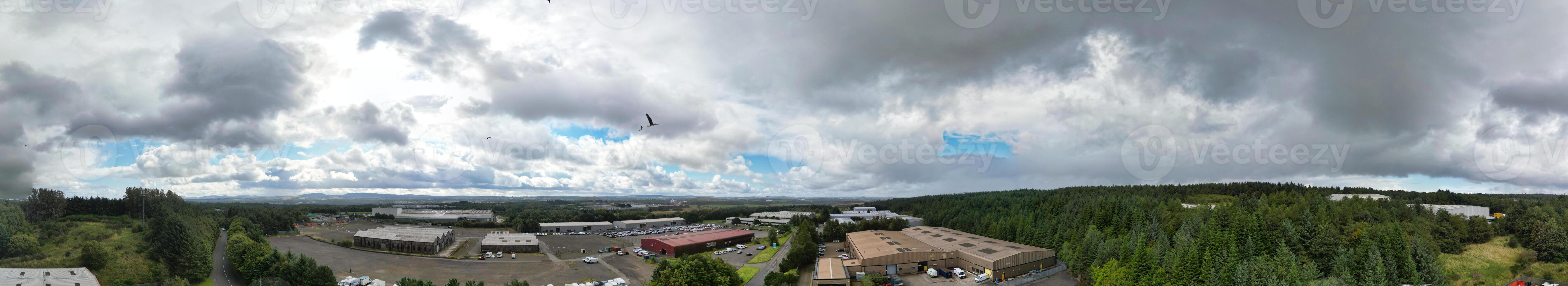 High Angle Wide Panoramic View of Central Edinburgh City of Scotland United Kingdom During Partly Cloudy Day of August 29th, 2024 photo