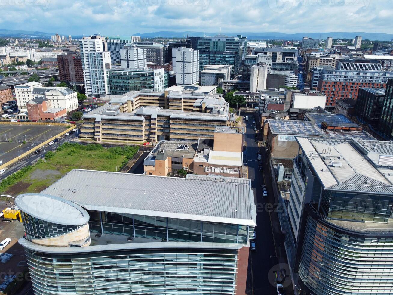 Aerial View of Buildings at Central Glasgow city of Scotland From River Clyde, Great Britain. June 5th, 2024 photo