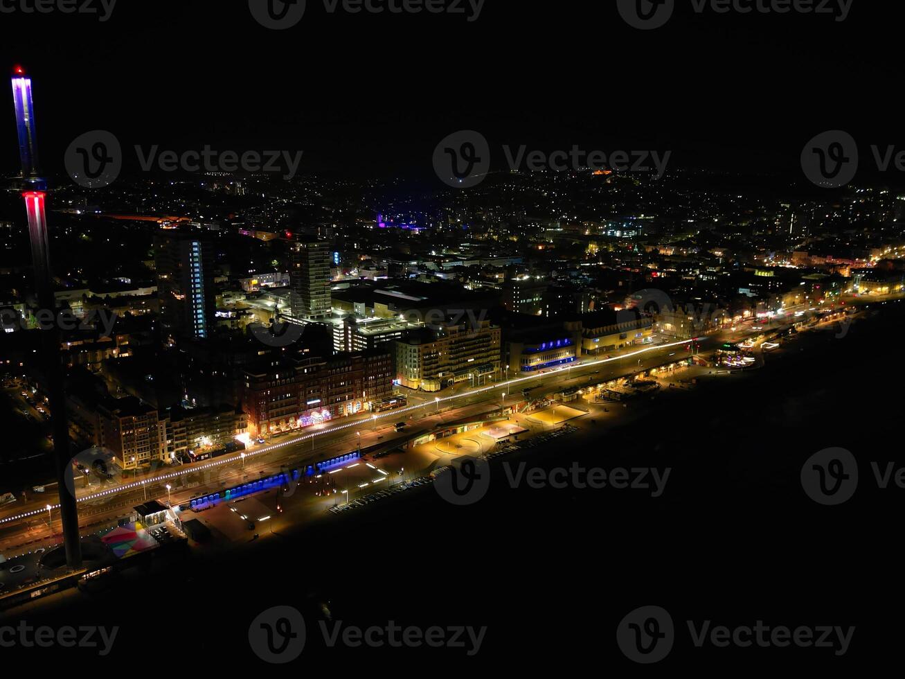 Aerial View of Illuminated Brighton and Hove City of England United Kingdom During Dark Night of May 9th, 2024 photo