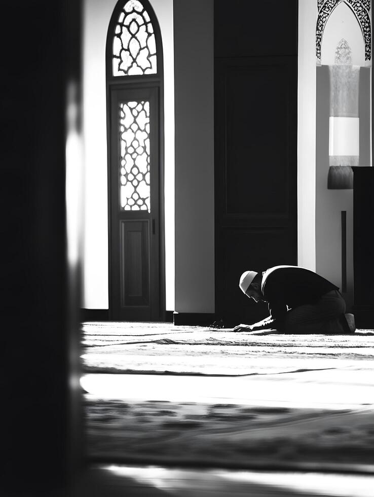 Praying muslim men. Believe in Islam in the Mosque photo