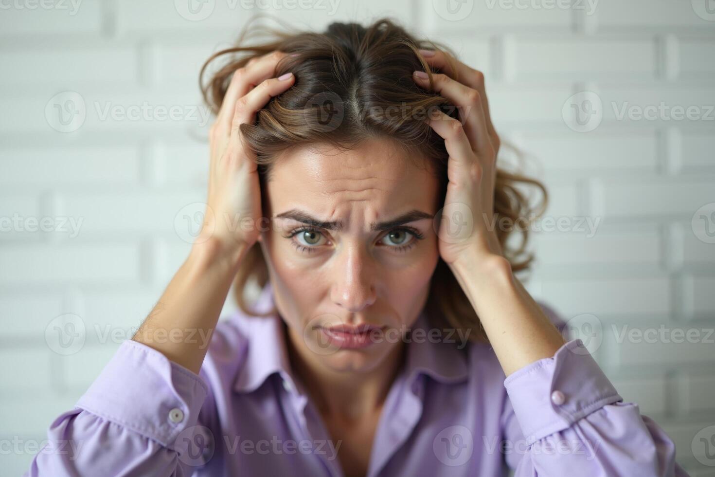close up of person head stressed about hair problem photo