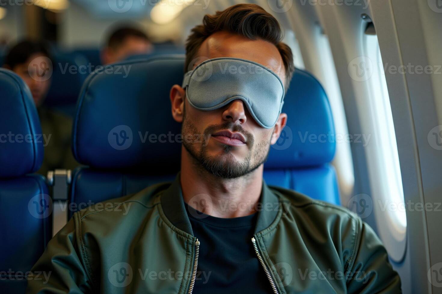 person sitting relax with blindfold and window plane in background photo