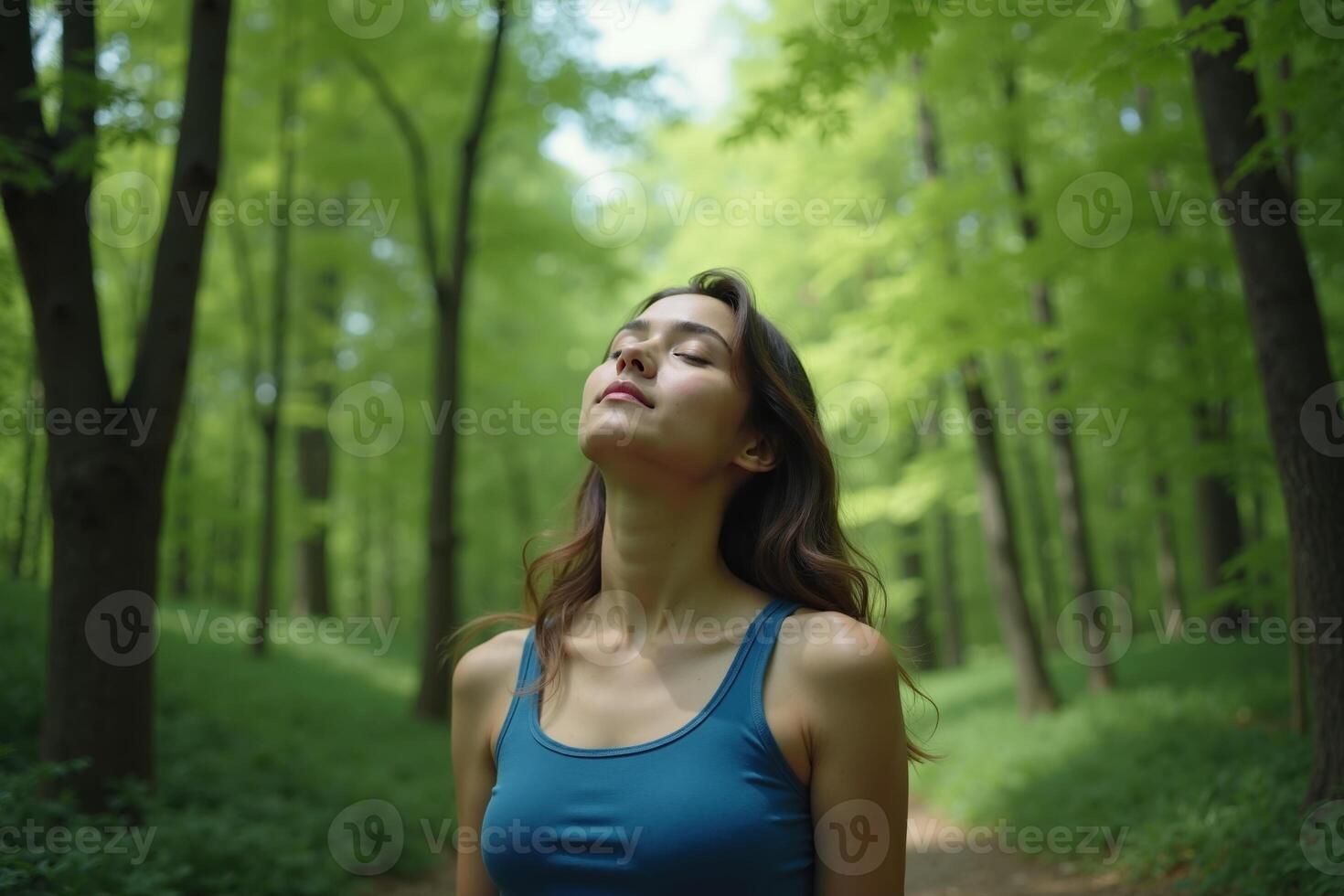 person standing looking up and enjoy the nature sense at the jungle, photo