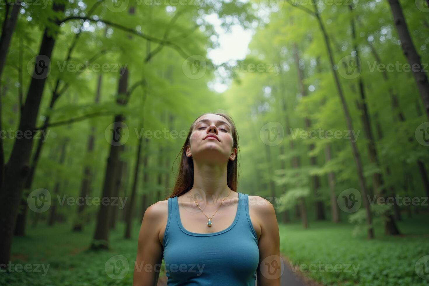 person standing looking up and enjoy the nature sense at the jungle, photo