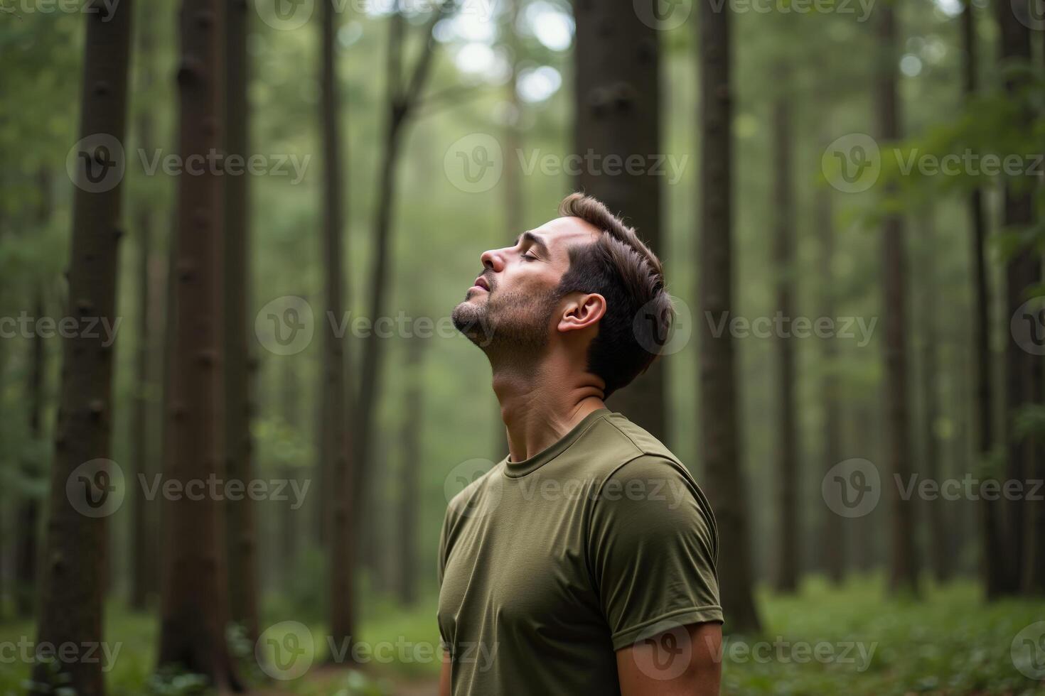 person standing looking up and enjoy the nature sense at the jungle, photo