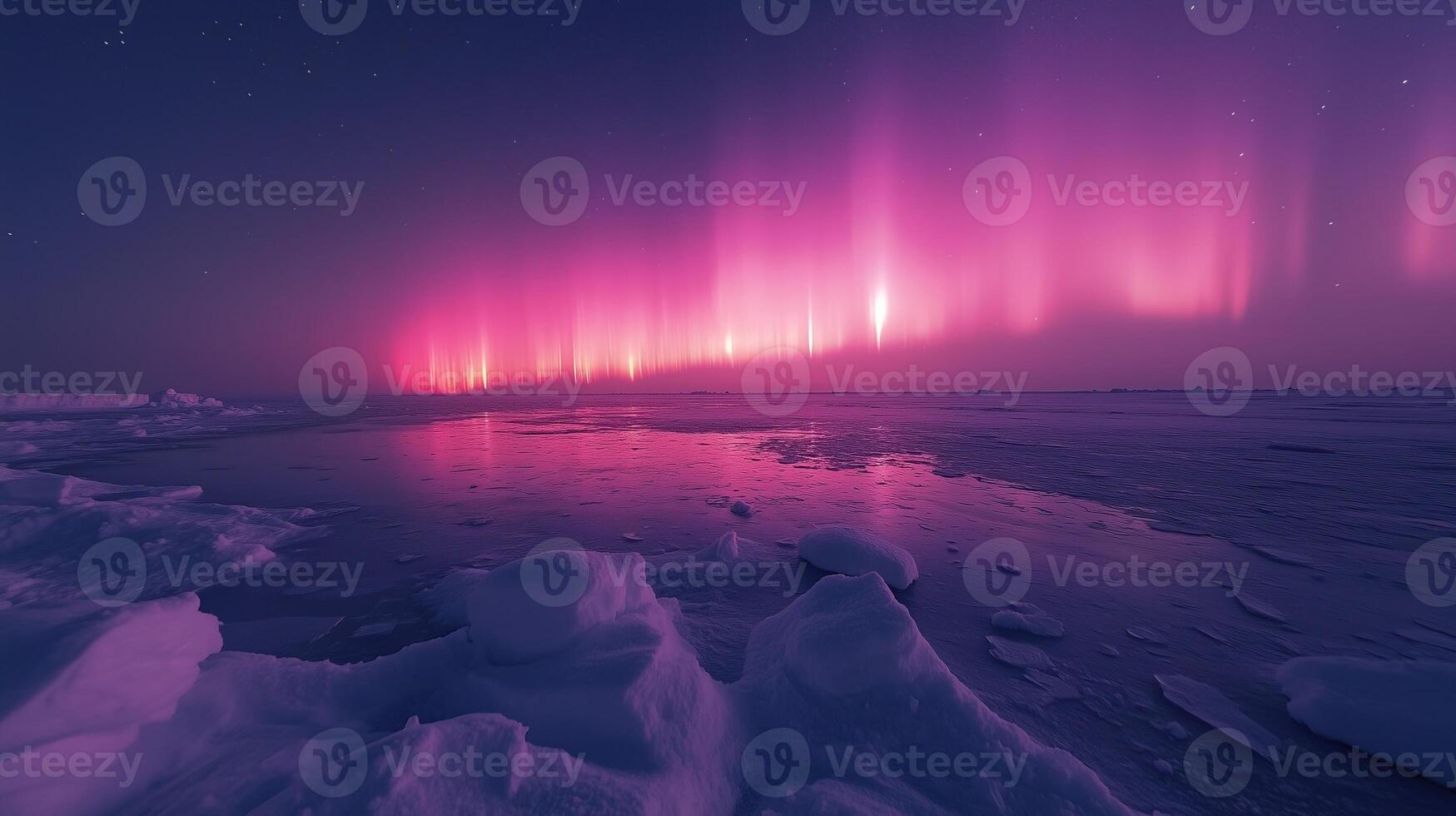 Pink aurora borealis, morthern lights over ice and snow landscape photo