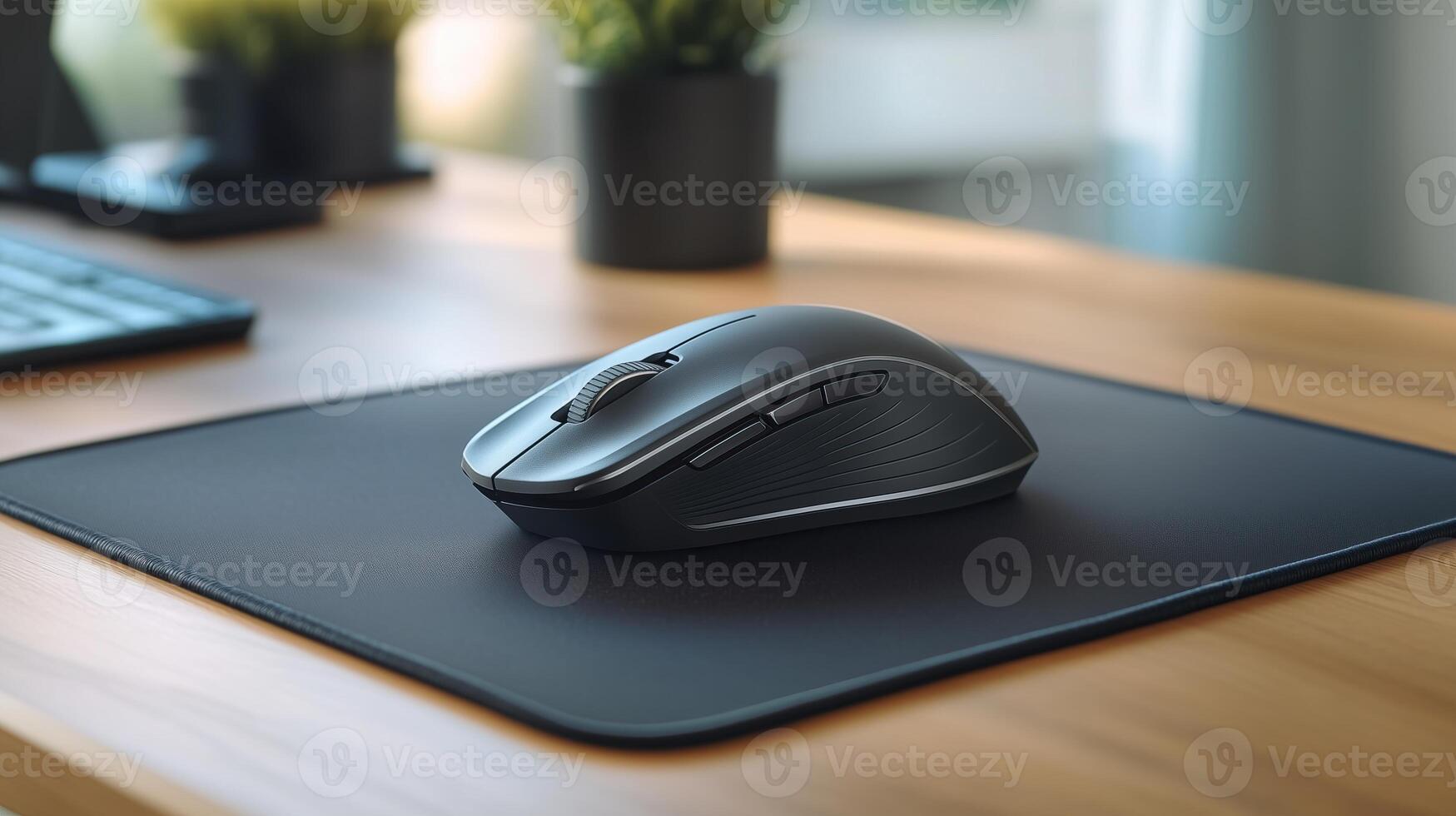 Wireless mouse with a scroll wheel on a mouse pad, ready for use photo