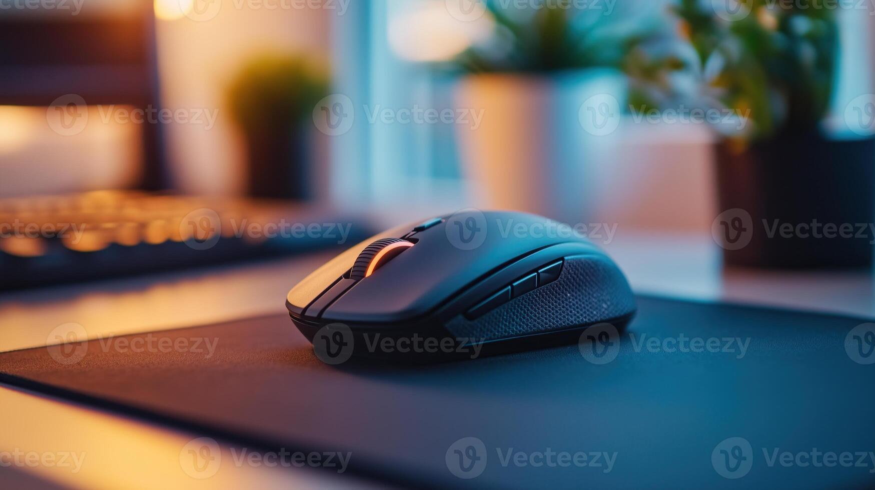 Wireless mouse with a scroll wheel on a mouse pad, ready for use photo