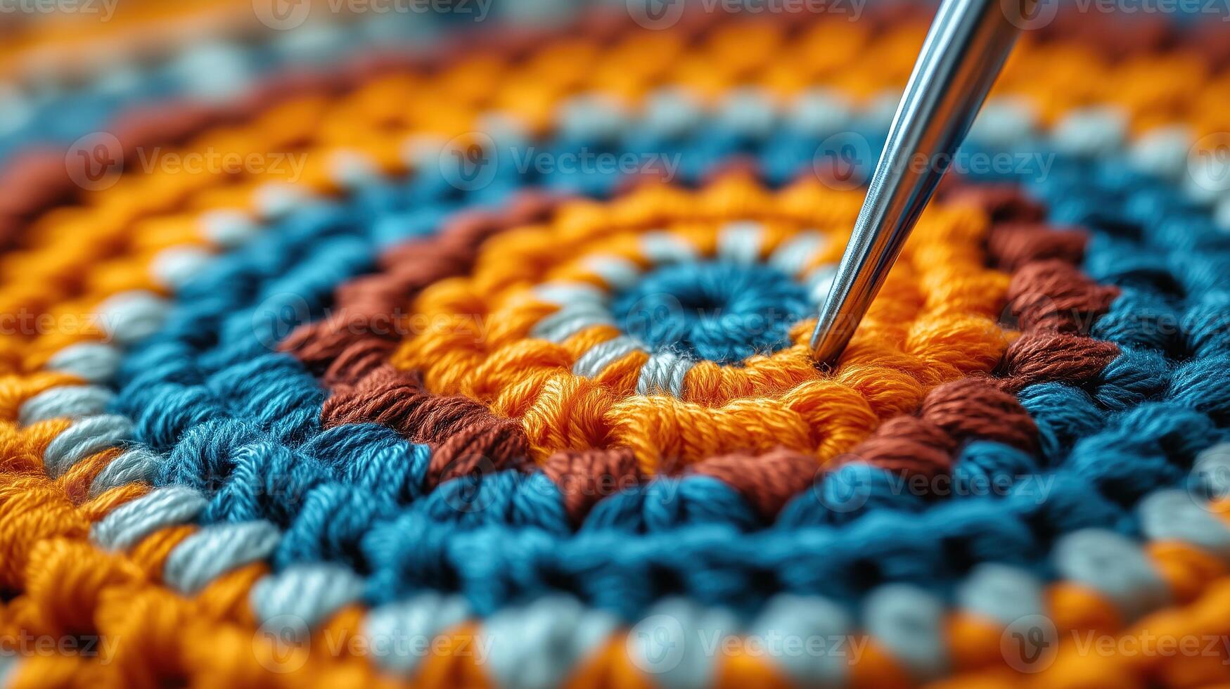 Crochet hook in use, with yarn forming intricate patterns photo