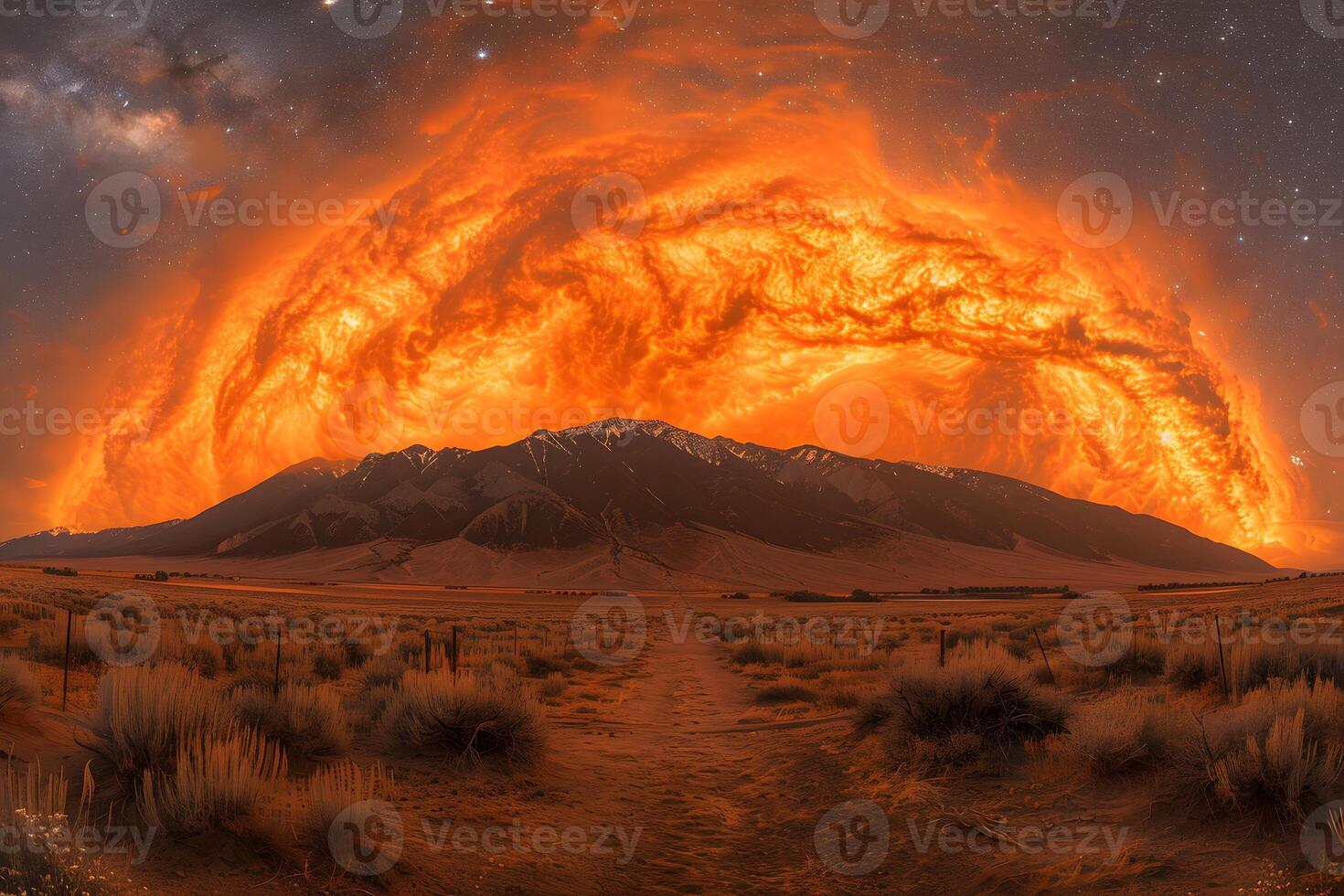 Fiery Sunset Over Majestic Mountain Range in Serene Desert Landscape photo
