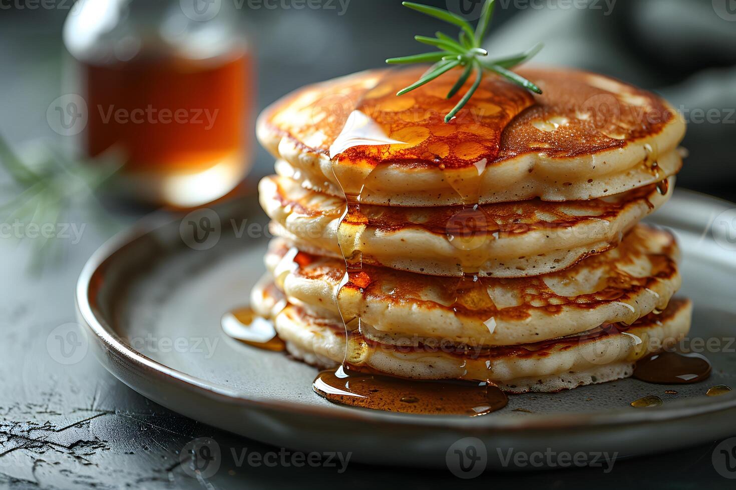 Delicious Stack of Pancakes with Maple Syrup Drizzle for Breakfast Delight photo
