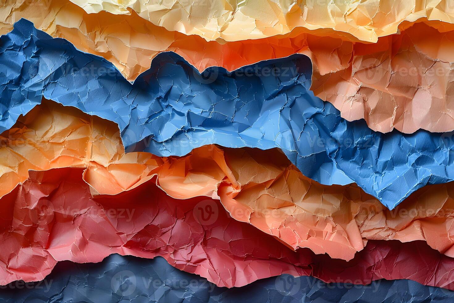 Colorful Abstract Layers of Torn Paper in Sunset Hues for Creative Design photo