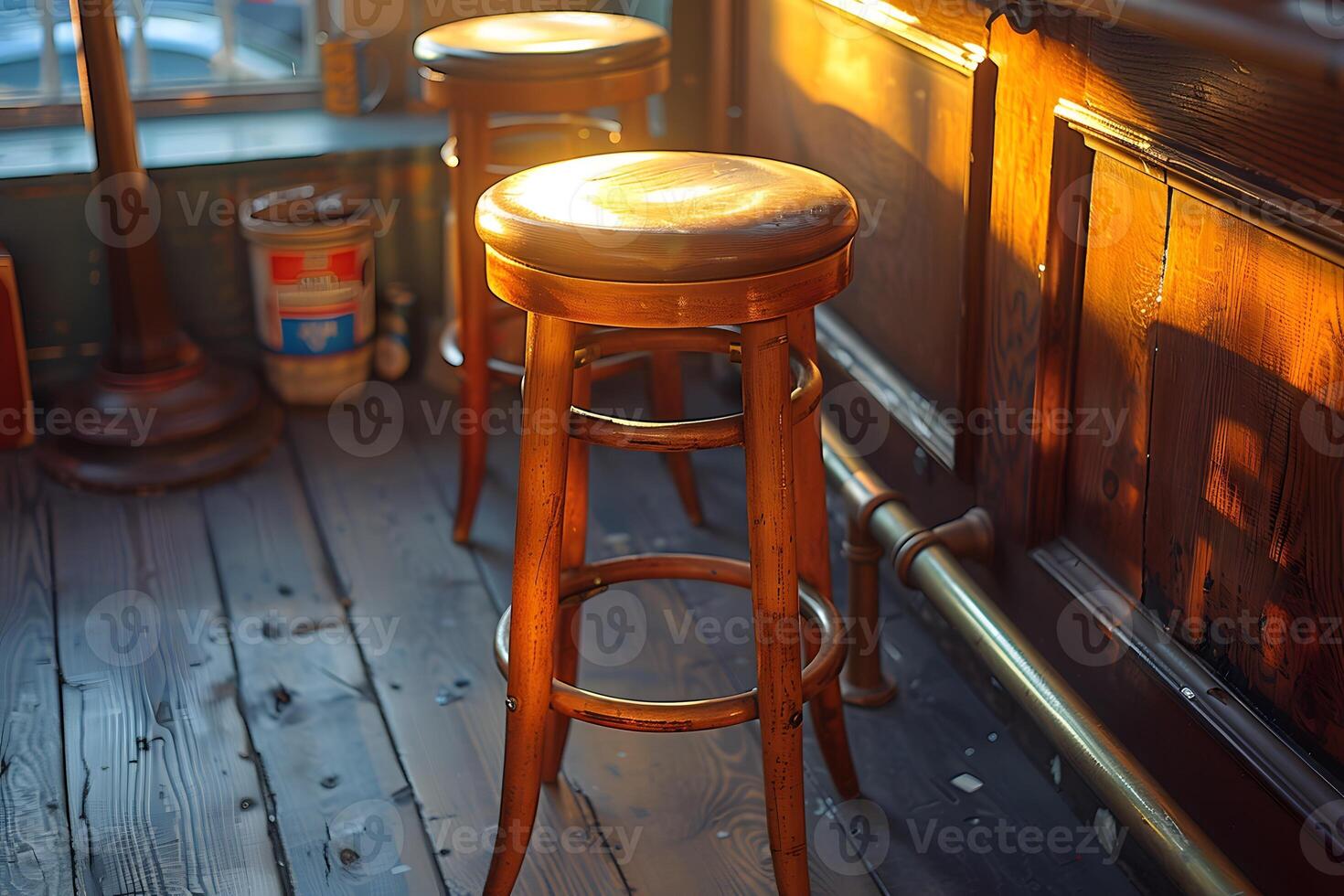 Cozy Bar Scene with Wooden Stools in Warm Sunlight for Rustic Decor and Hospitality Themes photo