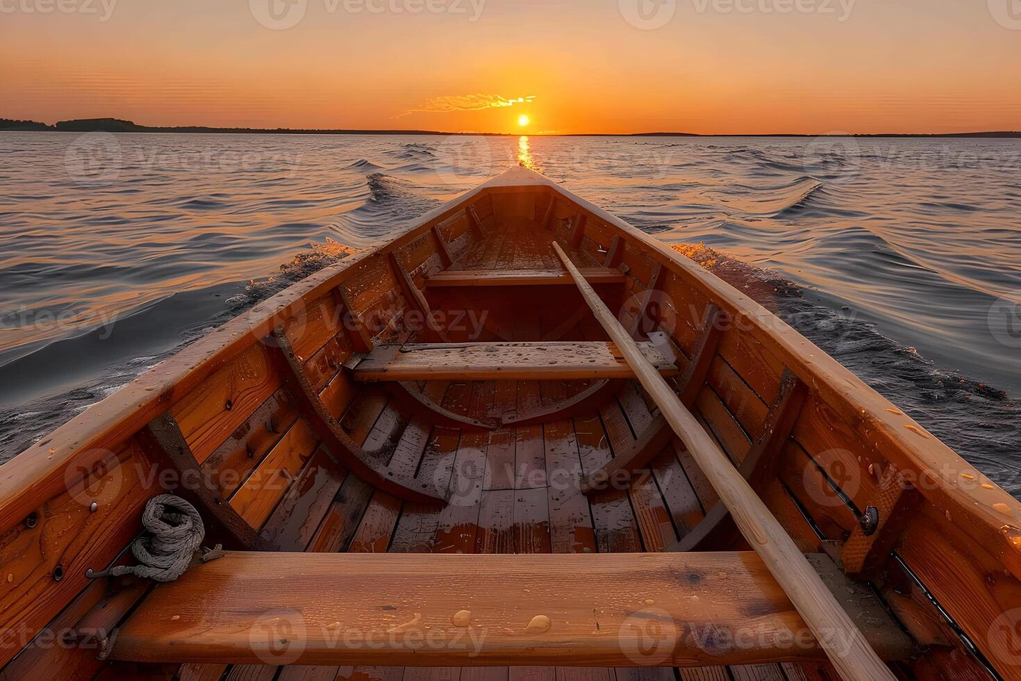 Serene Sunset Rowboat Journey on Tranquil Lake for Relaxation and Reflection photo